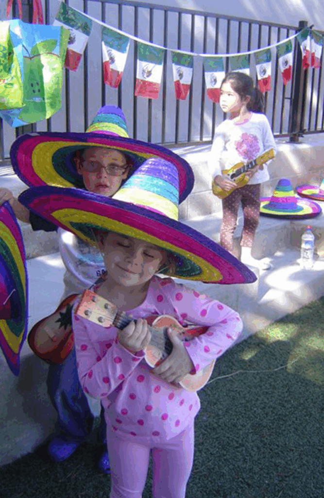 Children with colorful hats